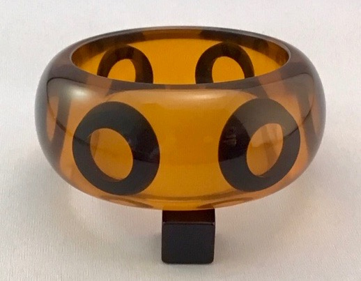 Evans 7 transparent amber bangle w black octopus eyes